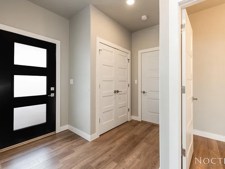 Entry way. (Photo of another unit with similar finishes and quality.)