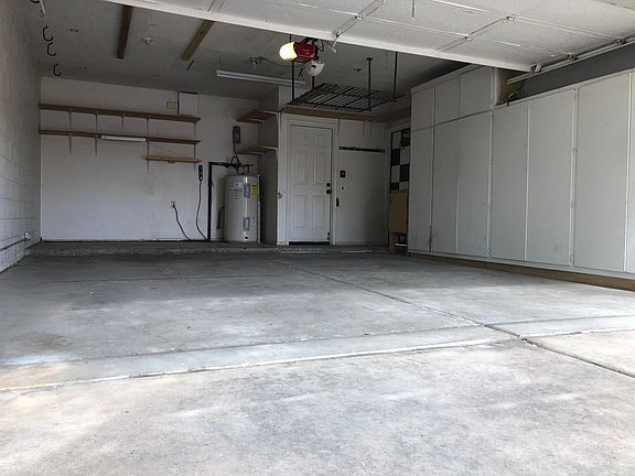 2 car garage with storage and attic access
