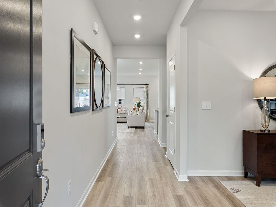 Step into the Chatham model apos s welcoming foyer.