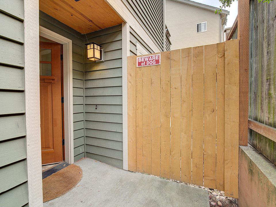 Front door, and gate access to fully fenced back yard