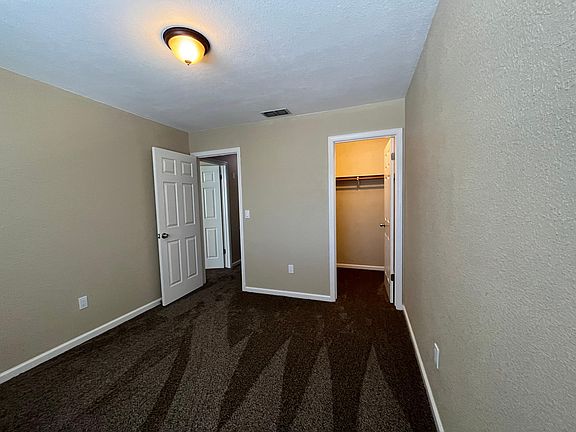 Bedroom 2 (upstairs) with walk-in closet