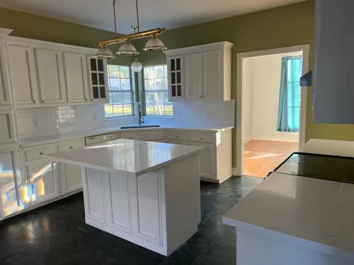 Recently renovated kitchen with new countertops and island - 1702 Fairview Dr