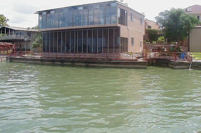 Lakeside with boat slip/sea wall