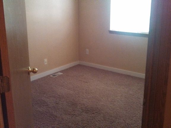 ONE OF THREE BEDROOMS