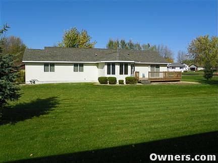 View of back yard and home