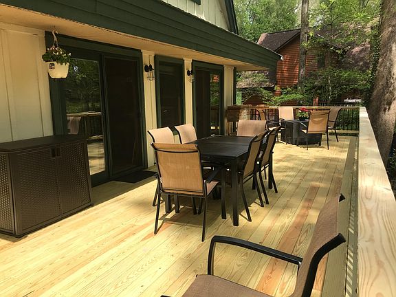 Brand new double decks overlooking mountains and quiet cove.