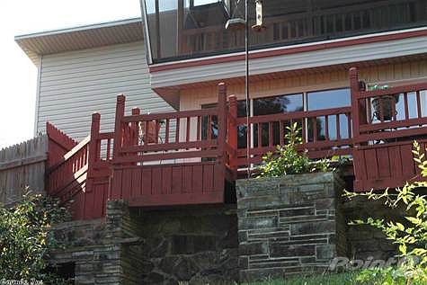 side of house facing lake notice upper screened in porch