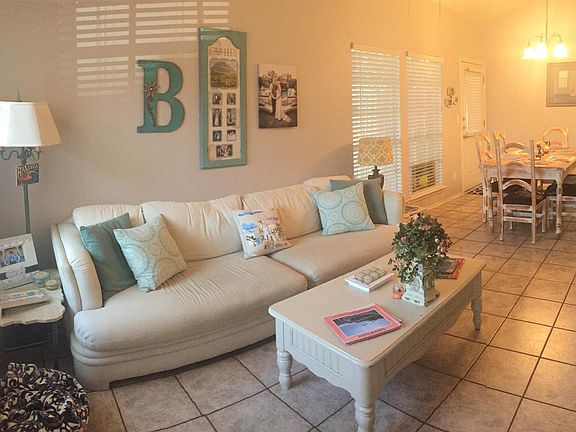 Walk in to your living room, dining room and kitchen combo well balanced with natural light and air flow if you prefer to have the doors open as we do.