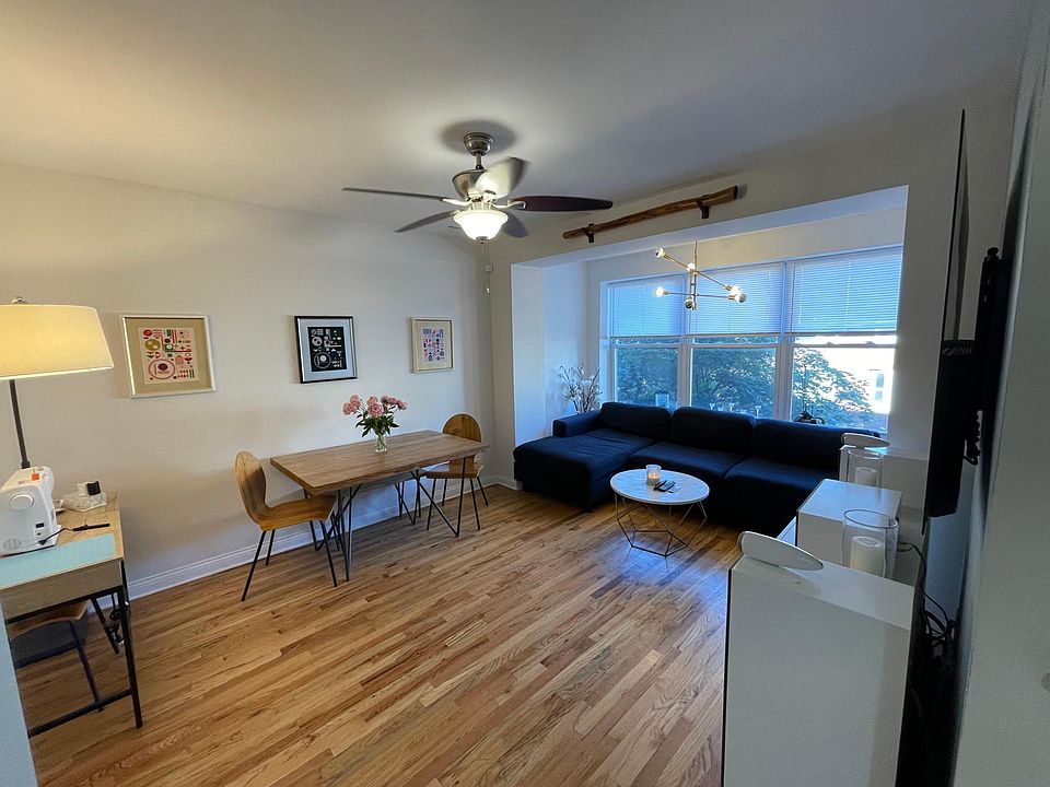 Large living room with space for dining room table. East facing windows allow TONS of light in.