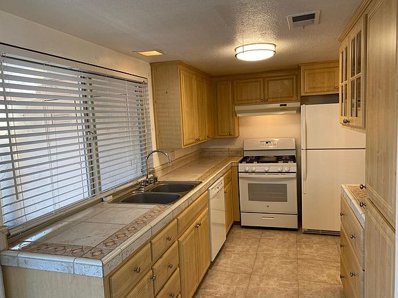 Kitchen w/custom tile counter tops