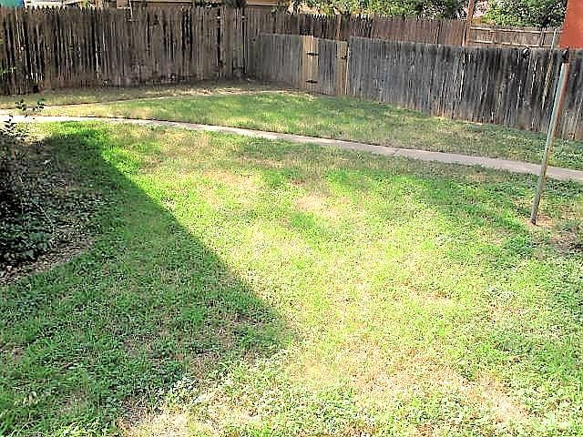 Large fenced backyard