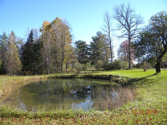 POND IN FRONT OF HOUSE
