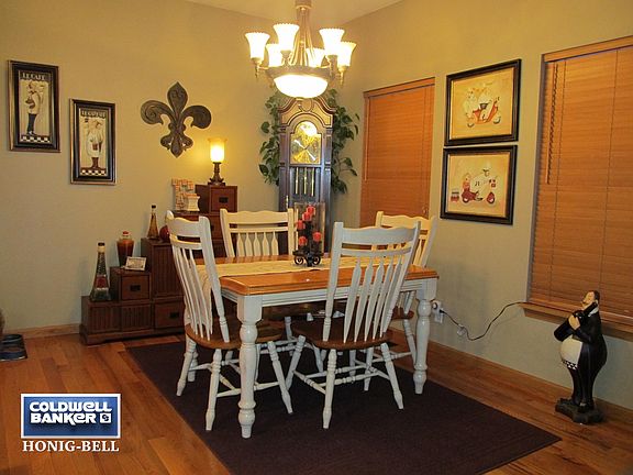 Elegant chandelier & hardwood flooring