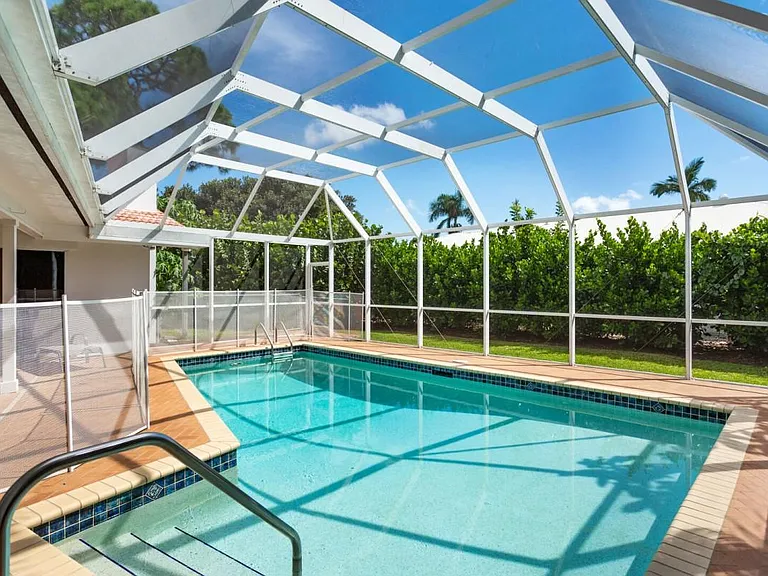 Pool with screened cage