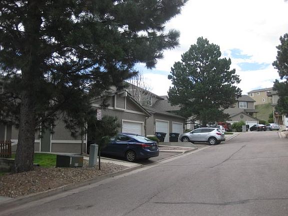 Townhouse on the left side of the street