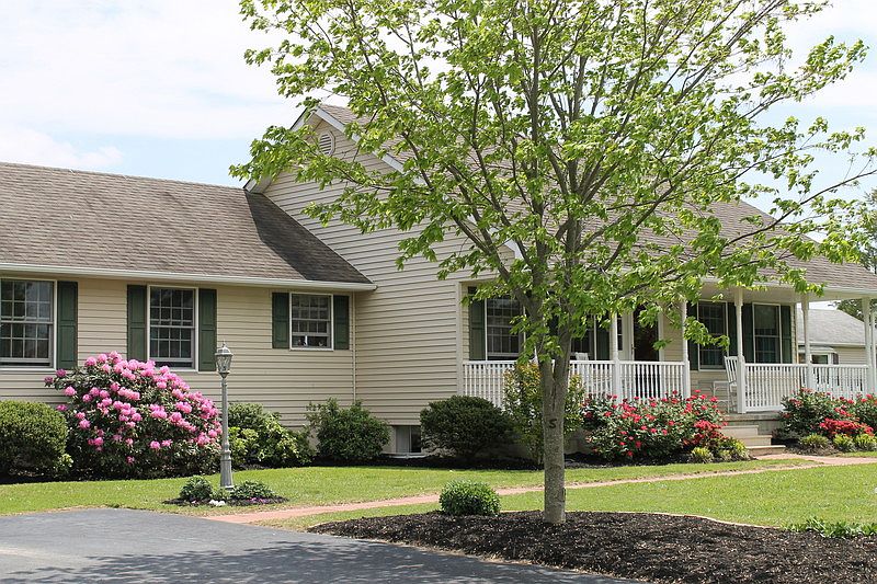 View of house from driveway
						:
						House in the spring time! Original owners. Amish-built foundation.