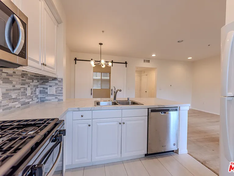 6020 Seabluff Dr #302 — Photo 11