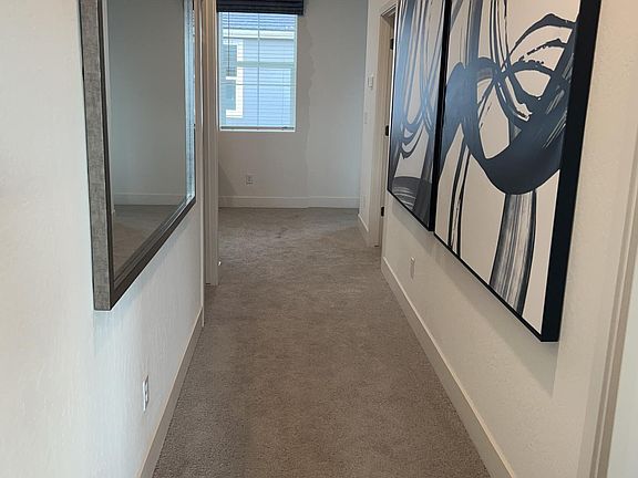 Hallway (model home picture provided for reference along with the actual home)