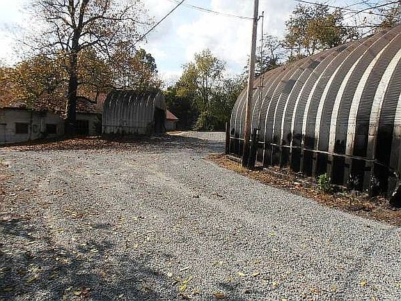 Driveway Along Outbuildings
