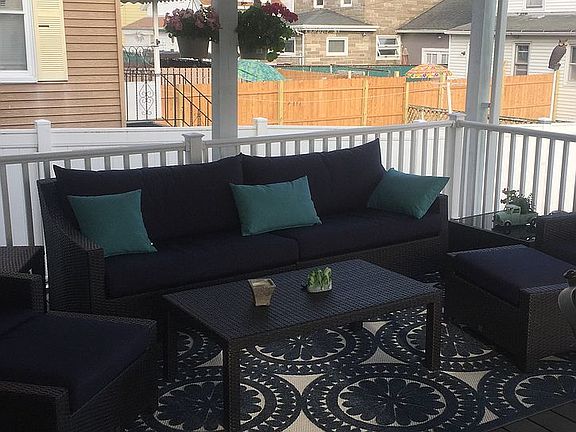 Back covered deck with TV