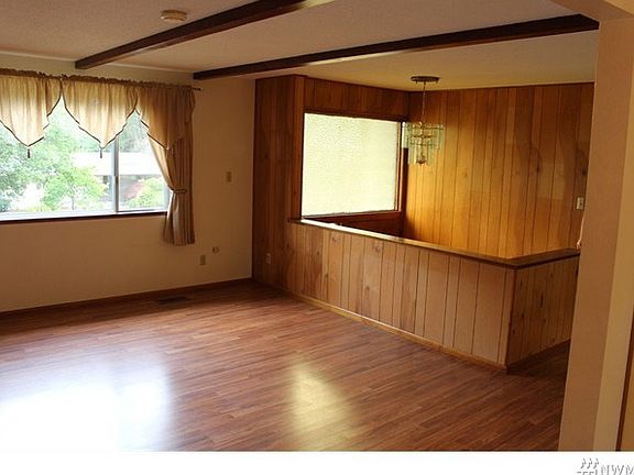 Another Living Room View...this shows the stairwell from the entry way.
