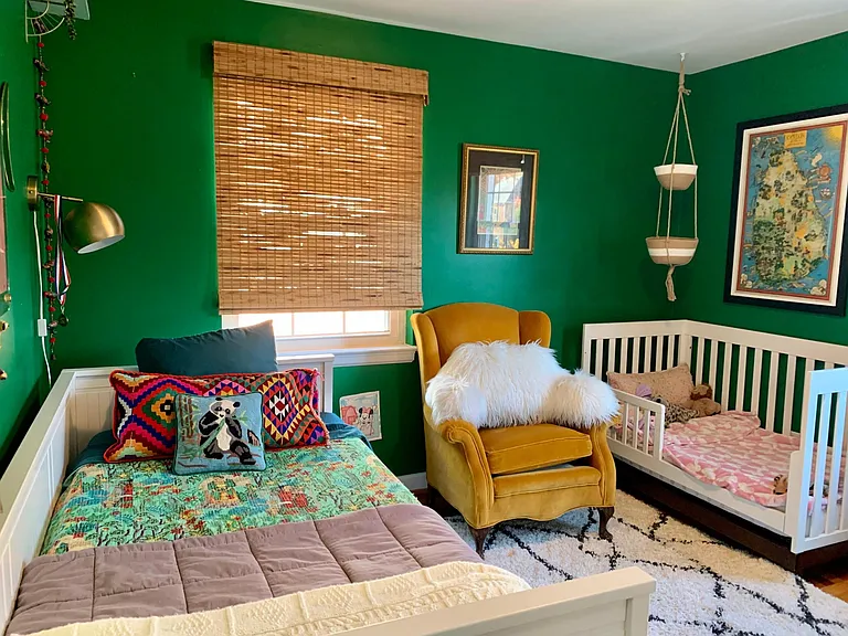 Second bedroom has a twin bed and crib or toddlers bed as seen here. If needed, the crib can be moved or removed and the bed can be reconfigured to a king size.