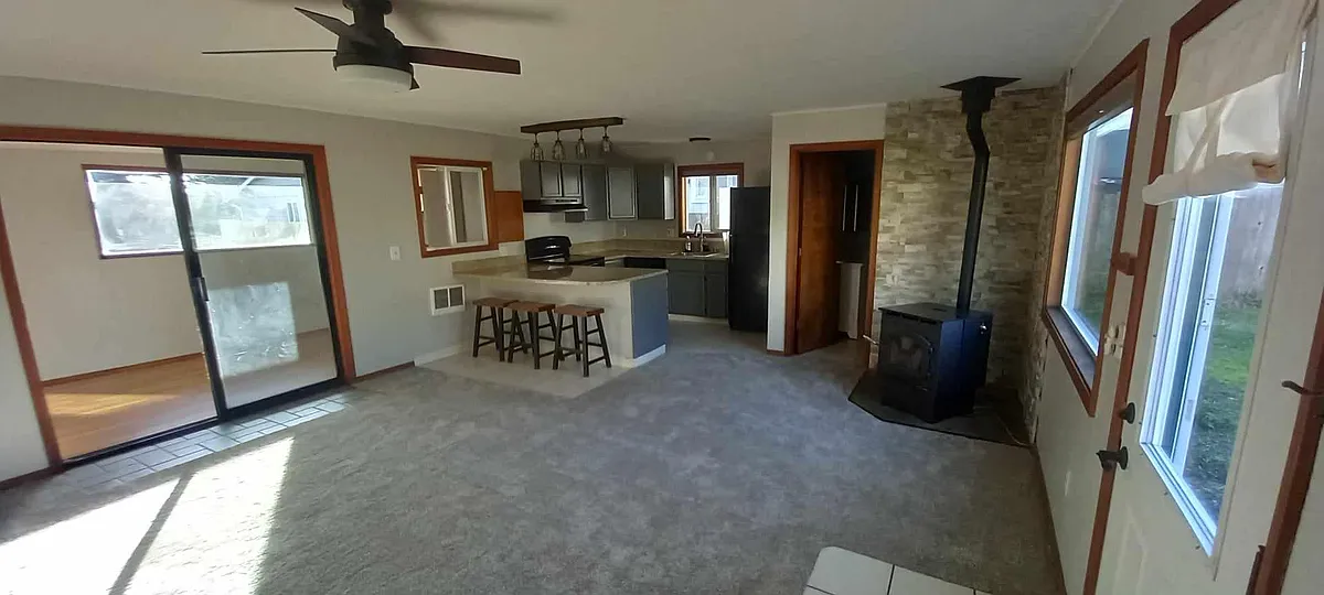 Living room with sunroom adjacent - 618 SW 28th St