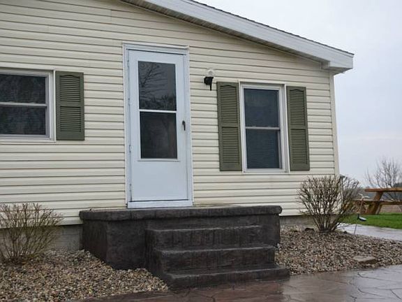 The side entrance is perfect for bringing in groceries.  It allows you to enter into the kitchen directly.