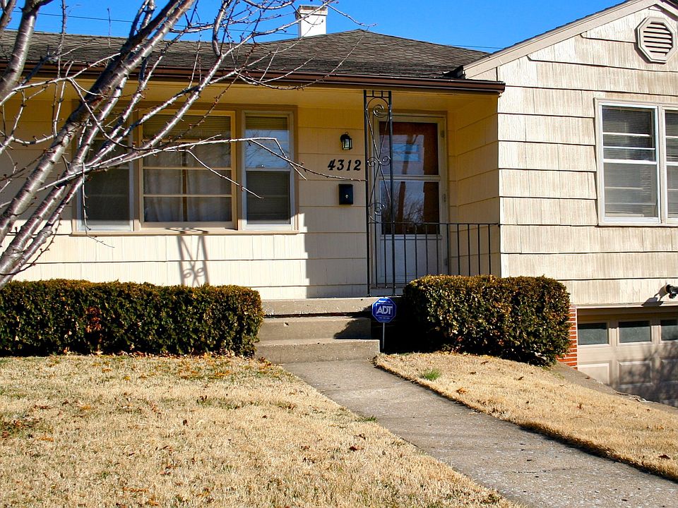 freshly painted exterior and new gutters
