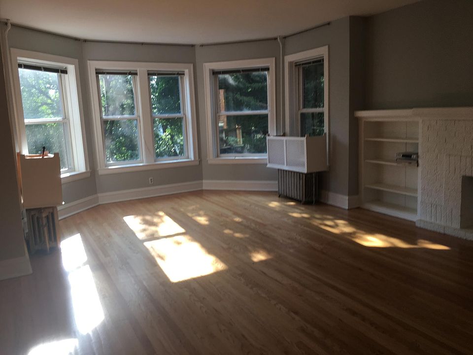 Large sunny living room with fireplace