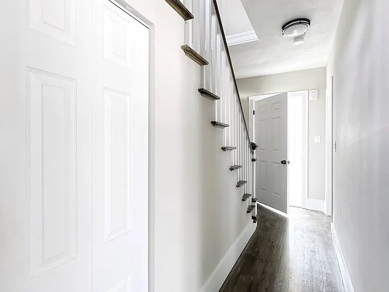Hallway and stairs to the rooms