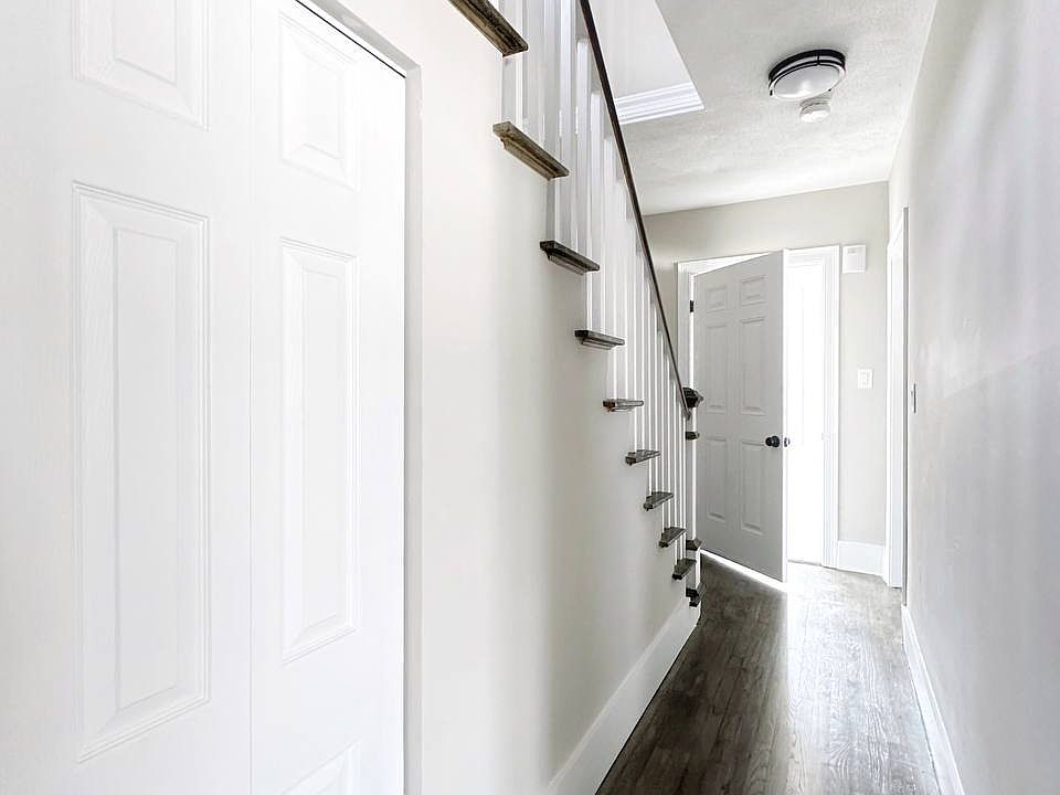 Hallway and stairs to the rooms