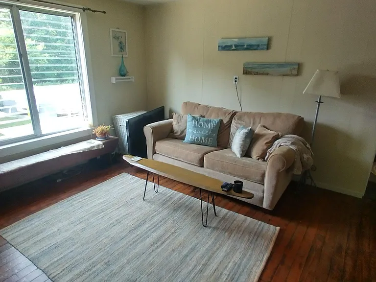 LIVING ROOM IS UPDATED / LIGHT GREY WALL WITH ONE DARK GREY ACCENT WALL AND BLACK CEILING. FLOOR IS NOW CARPETED