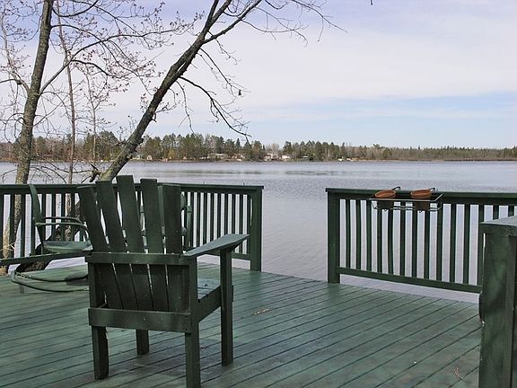 Enjoy the view from this lakefront deck. 