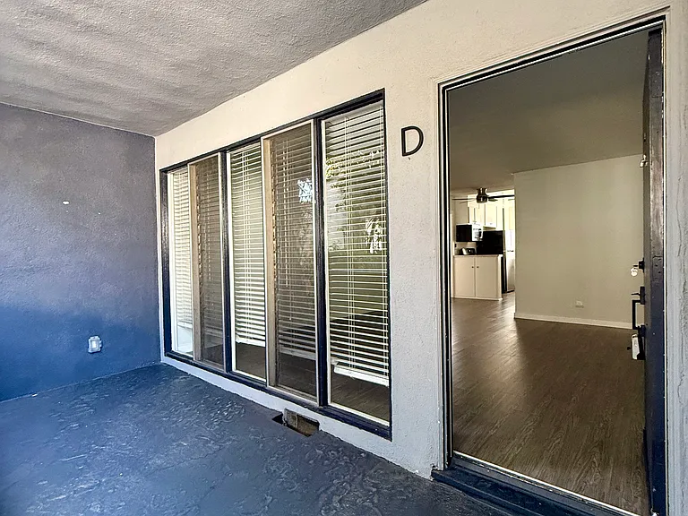Unit D's private patio and entrance to the unit.