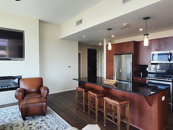 3rd image of 300 E 3rd St APT 1007