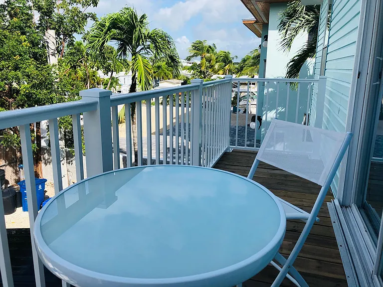 Bistro seating on master balcony