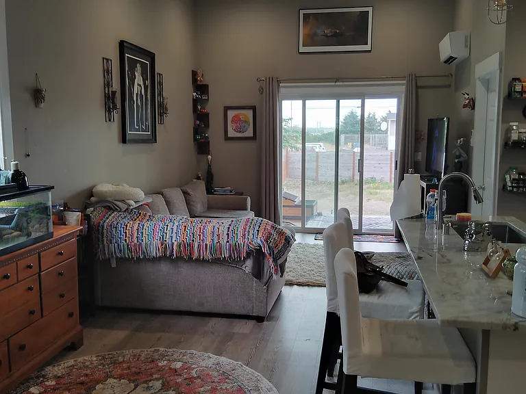 Can fit a dining room table and hutch and L-Shaped Couch