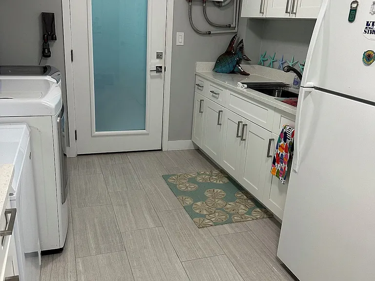 N Coconut Palm Blvd — Photo 26