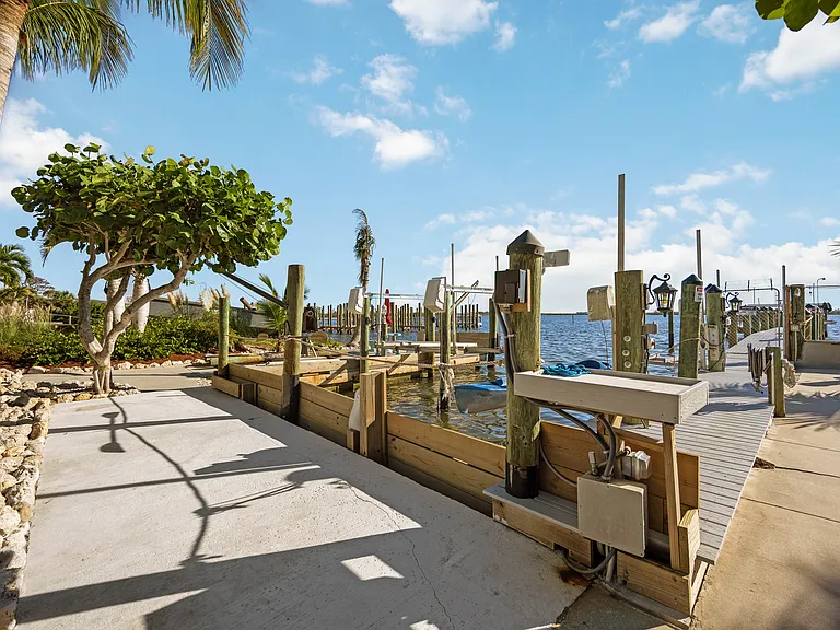 PRIVATE BOAT BASIIN WITH BOAT AND JET-SKI LIFTS