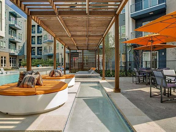 Serene pool with private cabanas.