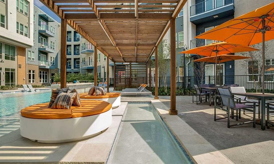 Serene pool with private cabanas.