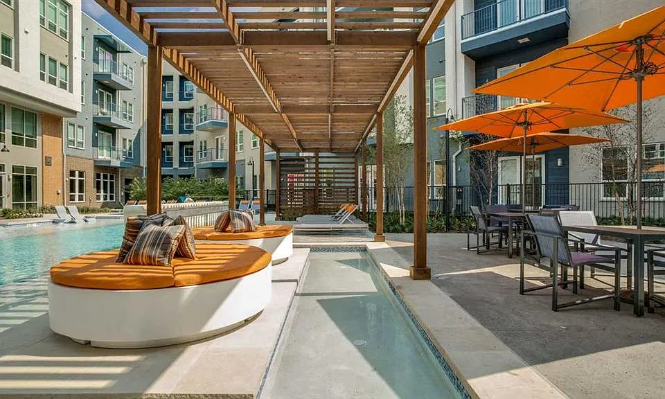 Serene pool with private cabanas.