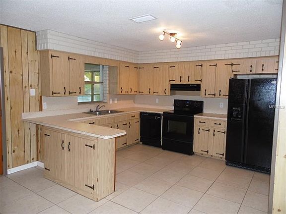 Kitchen area has updated appliances