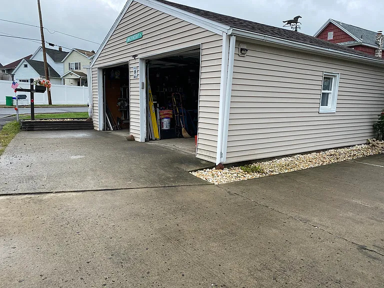 2 door garage with side pad for additional off street parking