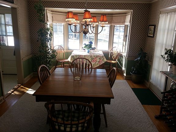 Formal dining room with bay