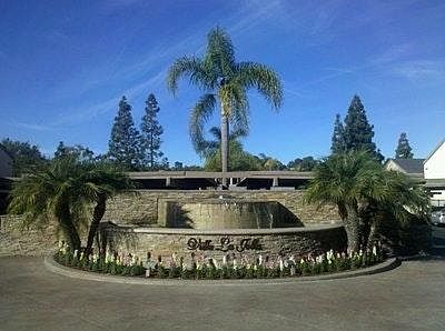 Entrance with waterfall to Villa La Jolla Condominiums