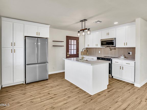 5th image of 7256 E MCKELLIPS Road