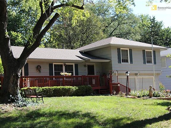 Wonderful front deck to enjoy the neighborhood.