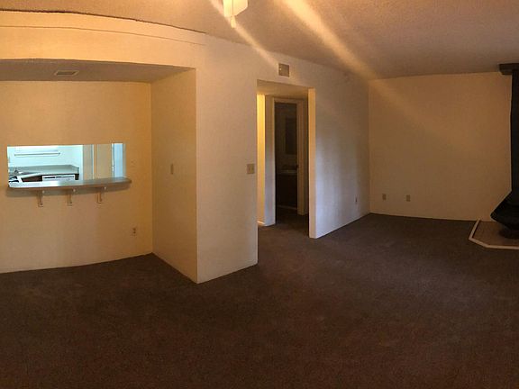 Living Area with Breakfast Nook & Wood Burning Stove